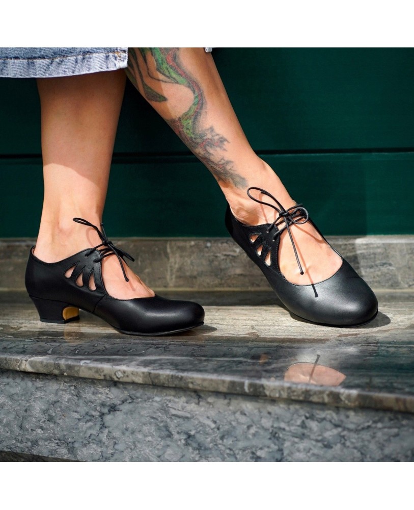 Black leather lace-up high heels