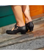 Black leather lace-up high heels