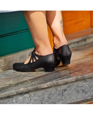 Black leather lace-up high heels