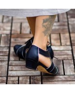 Black hollow leather lace-up shoes